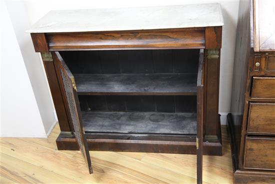 A Regency mahogany marble top side cabinet, W.3ft 6in.